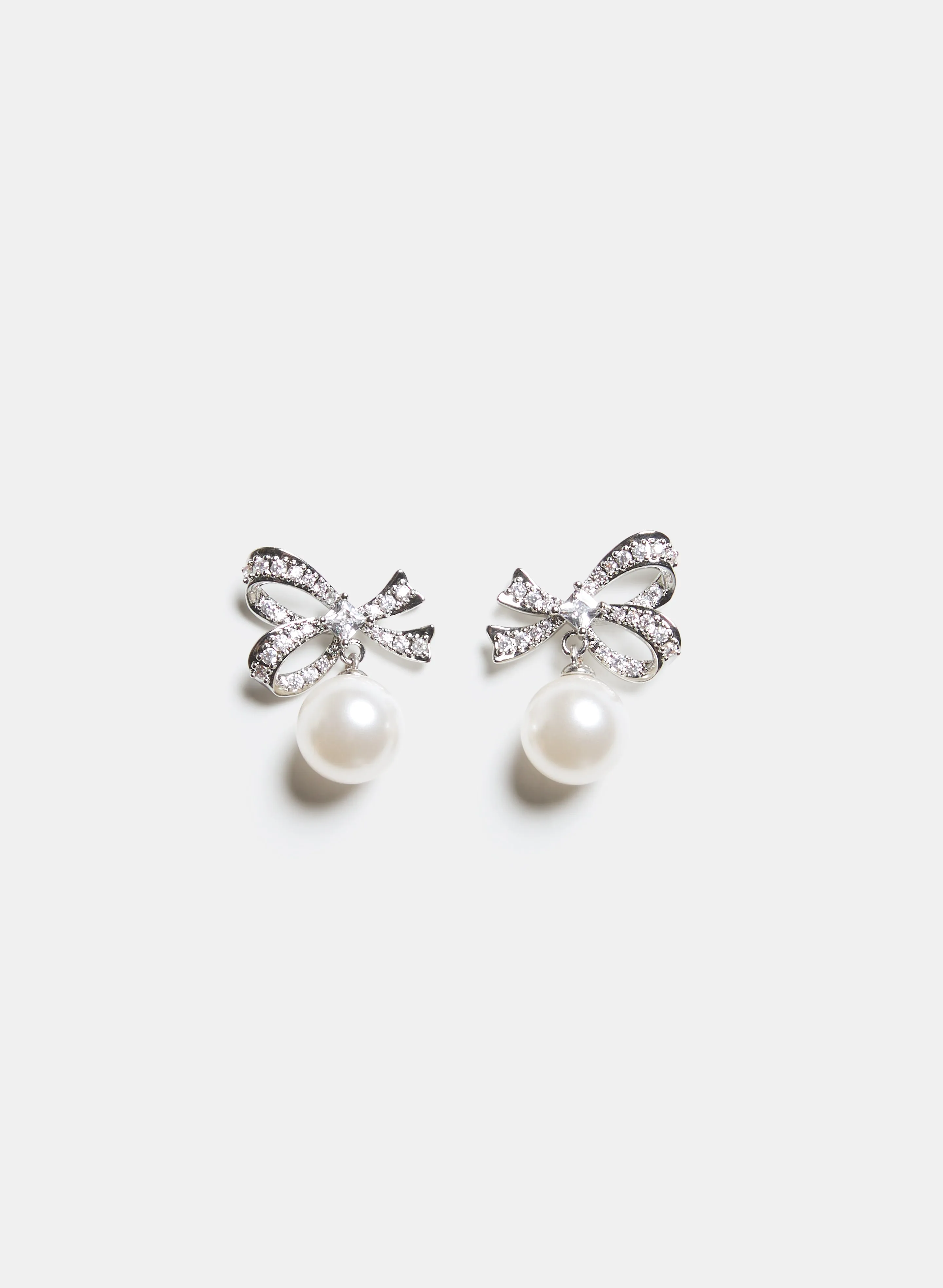 Bow & Pearl Drop Earrings sold by Laura