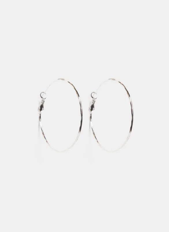 Faceted Hoop Earrings sold by Laura