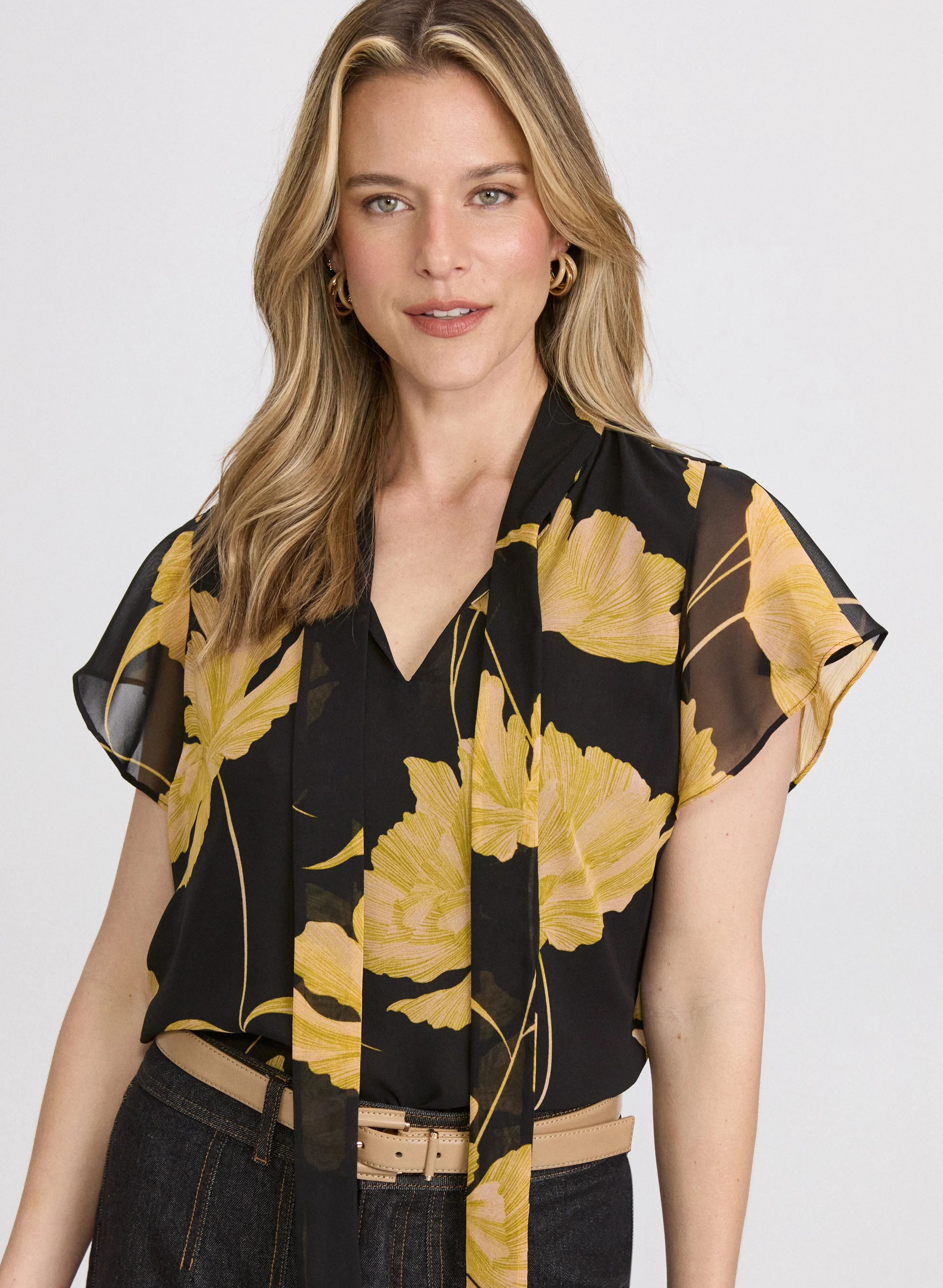 Floral Tie-Neck Blouse sold by Laura