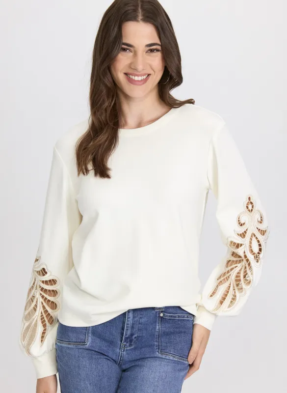 Embroidered Sleeve Top sold by Laura