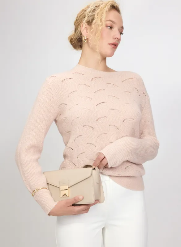 Open Knit Metallic Sweater sold by Laura