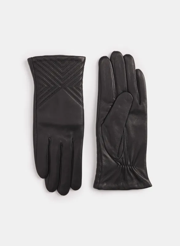 Embossed Sheepskin Gloves sold by Laura