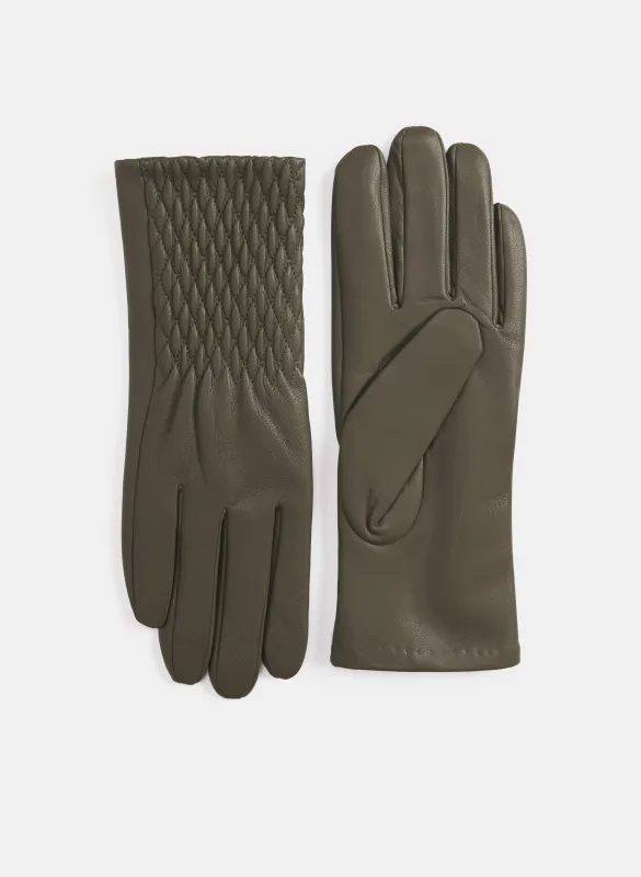 Quilted Gloves sold by Laura