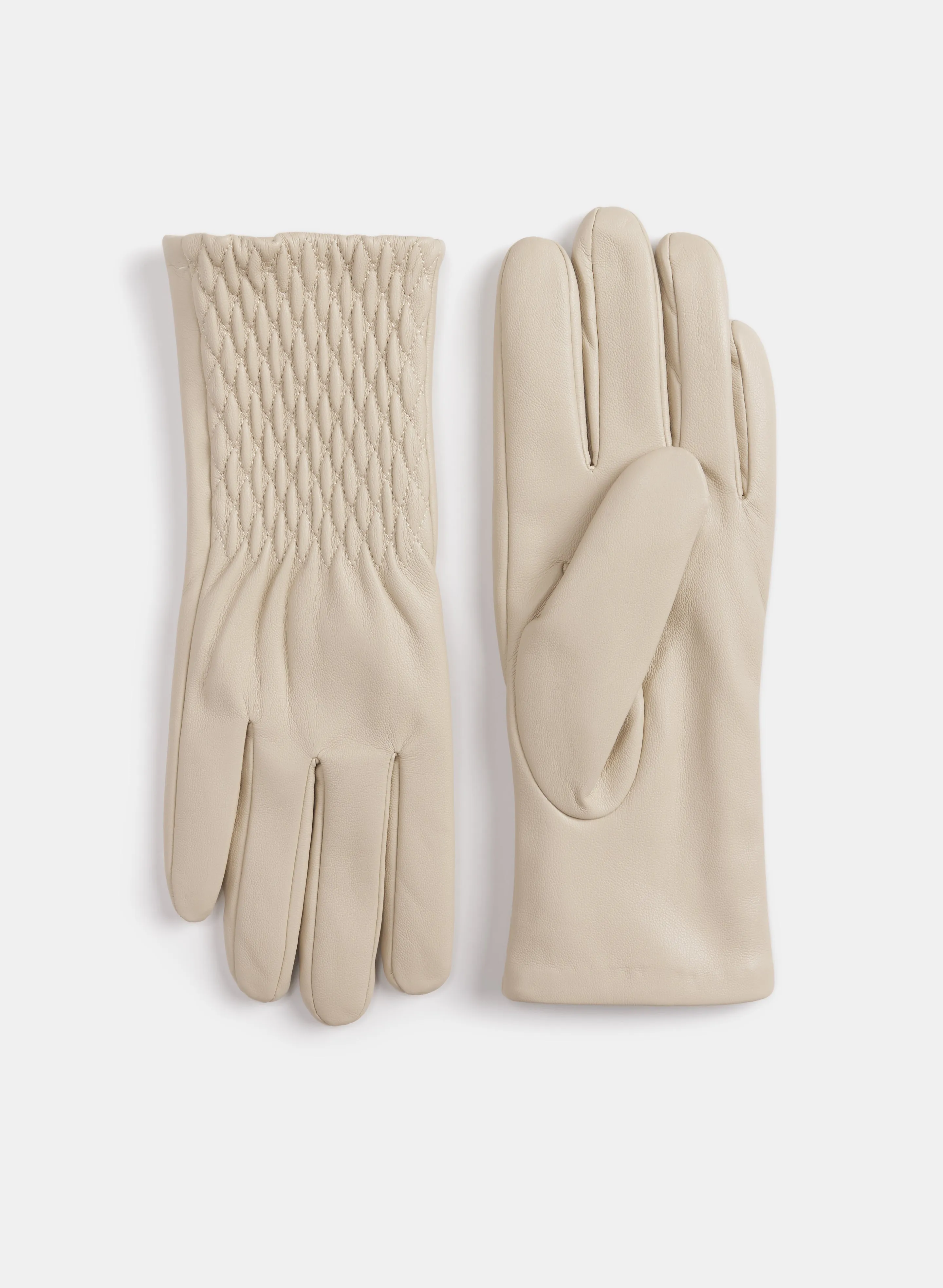 Quilted Gloves sold by Laura