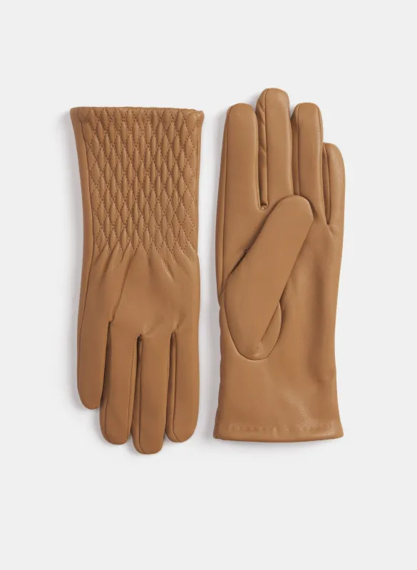 Quilted Gloves sold by Laura