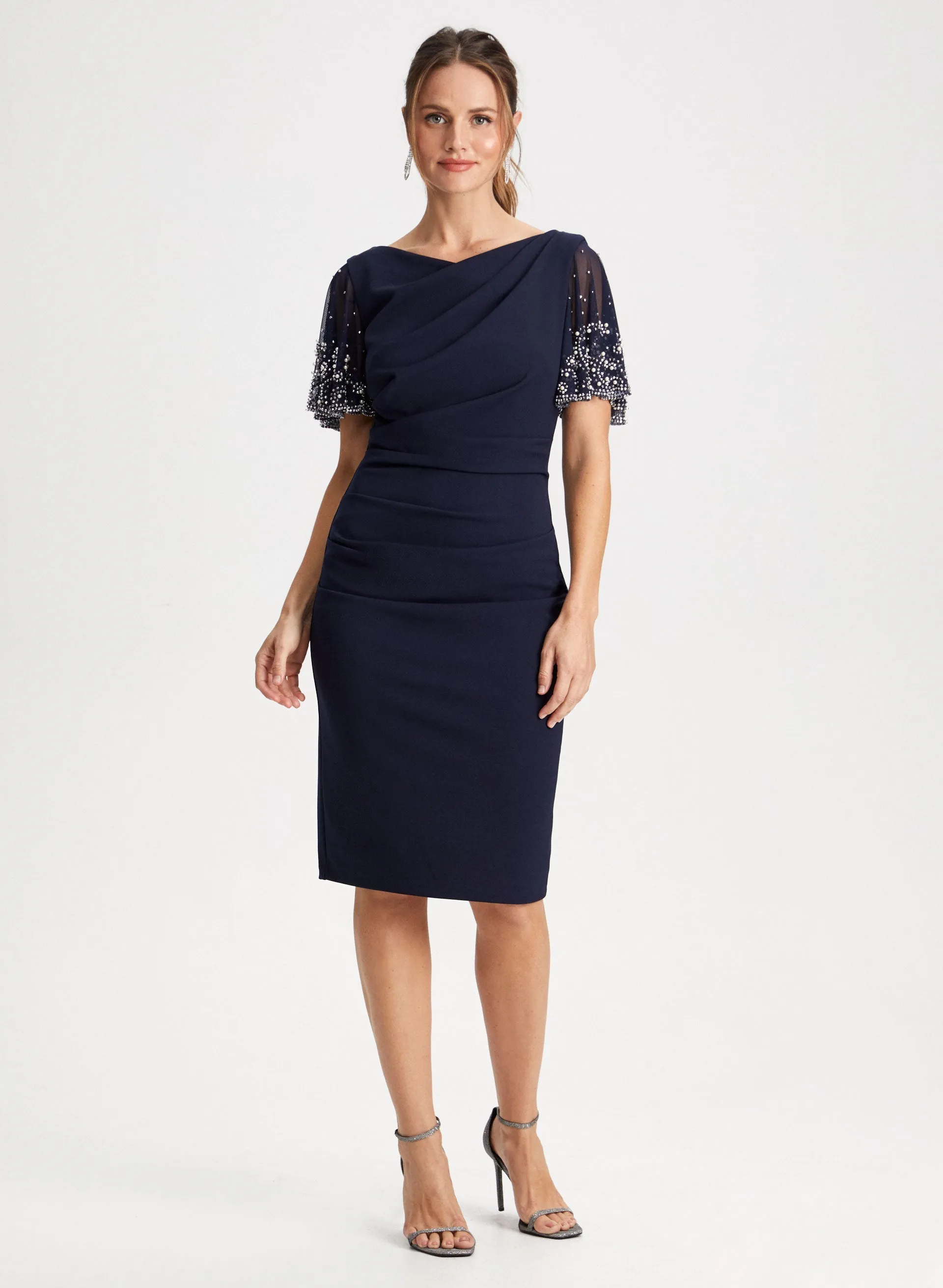 Beaded Sleeve Dress sold by Laura