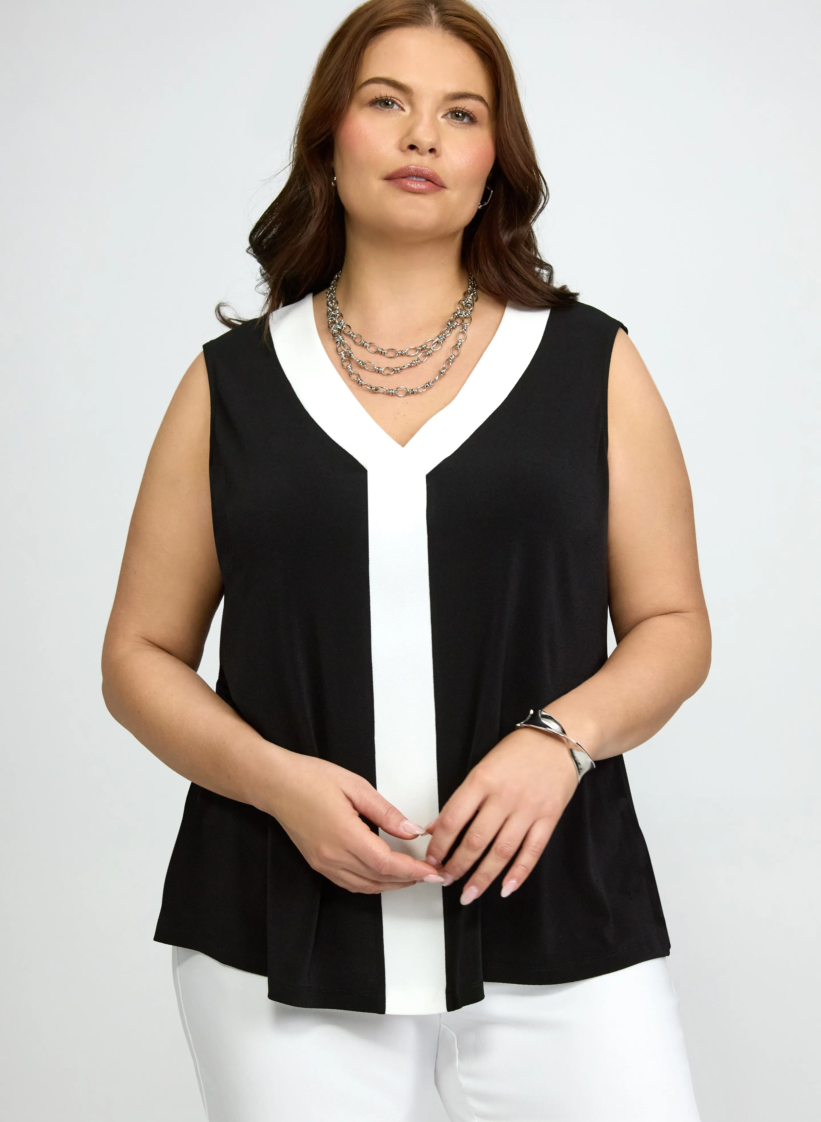 Contrast Top sold by Laura