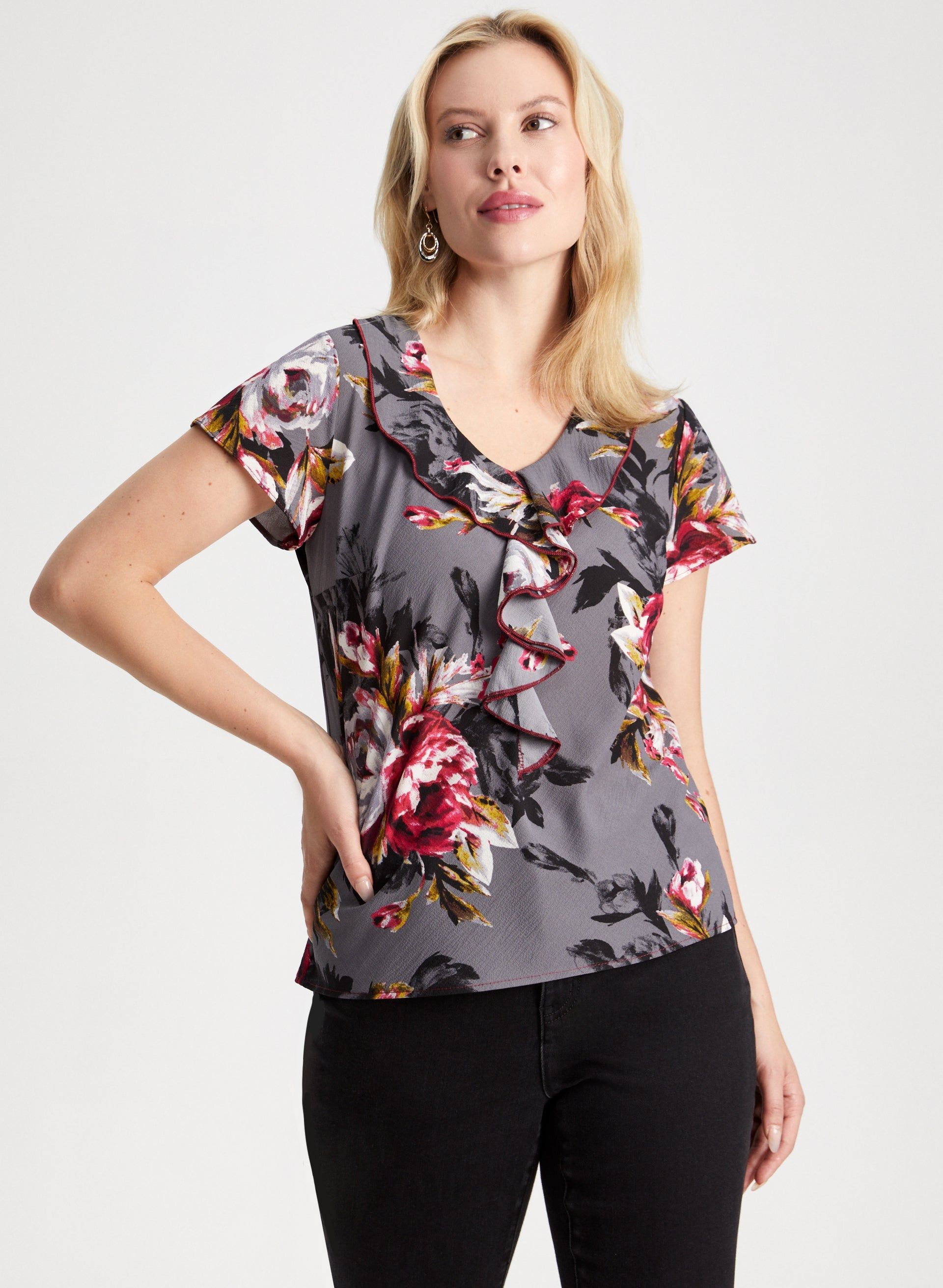 Ruffle Detail Floral Blouse sold by Laura