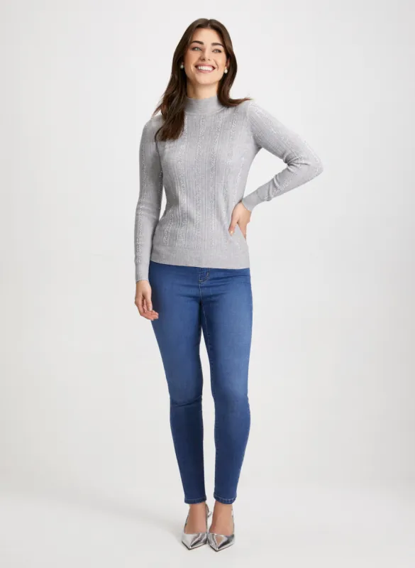 Rhinestone Embellished Sweater & Slim Leg Jeans sold by Laura