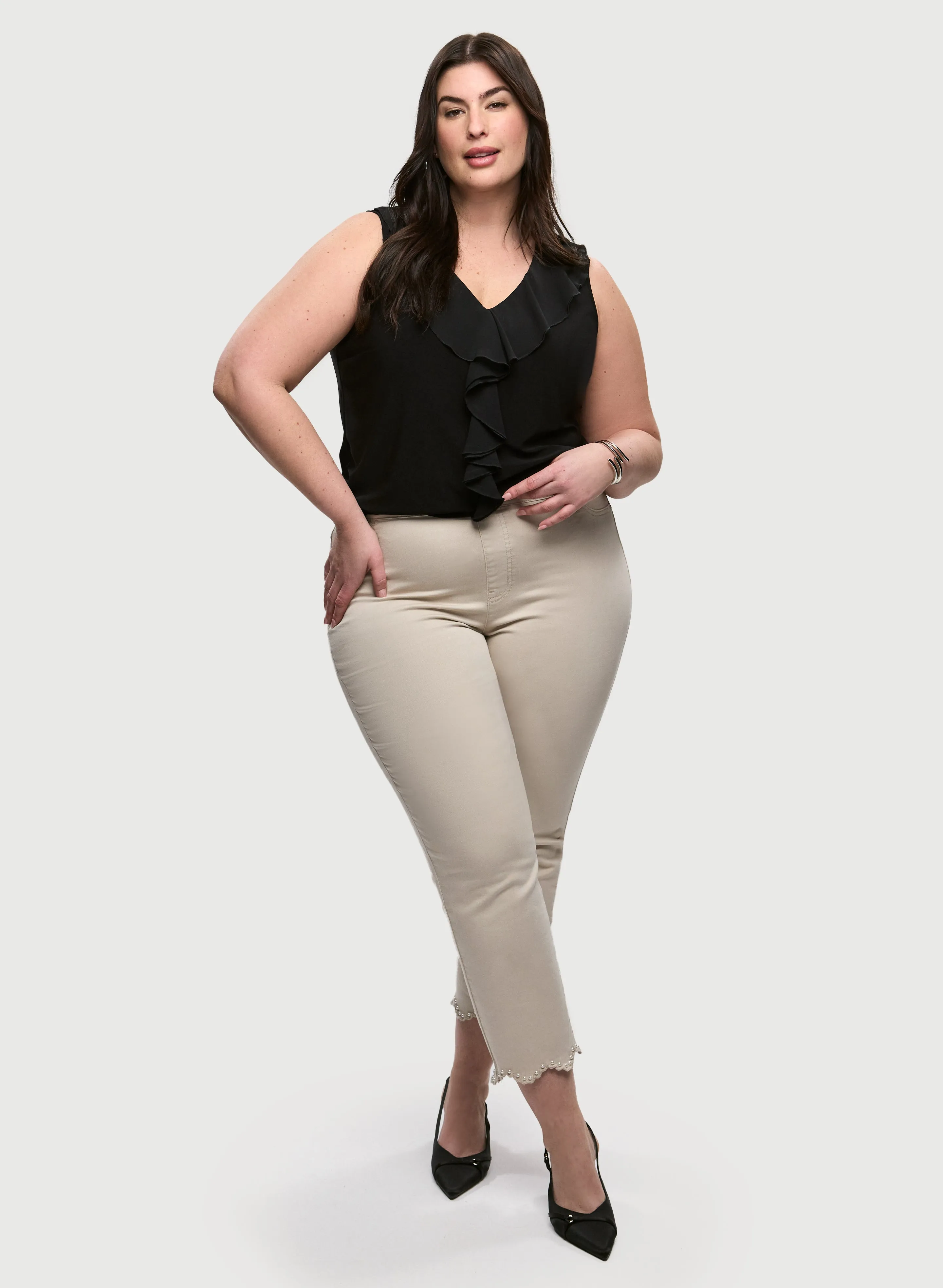 Ruffled Sleeveless Top & Straight Leg Jeans sold by Laura