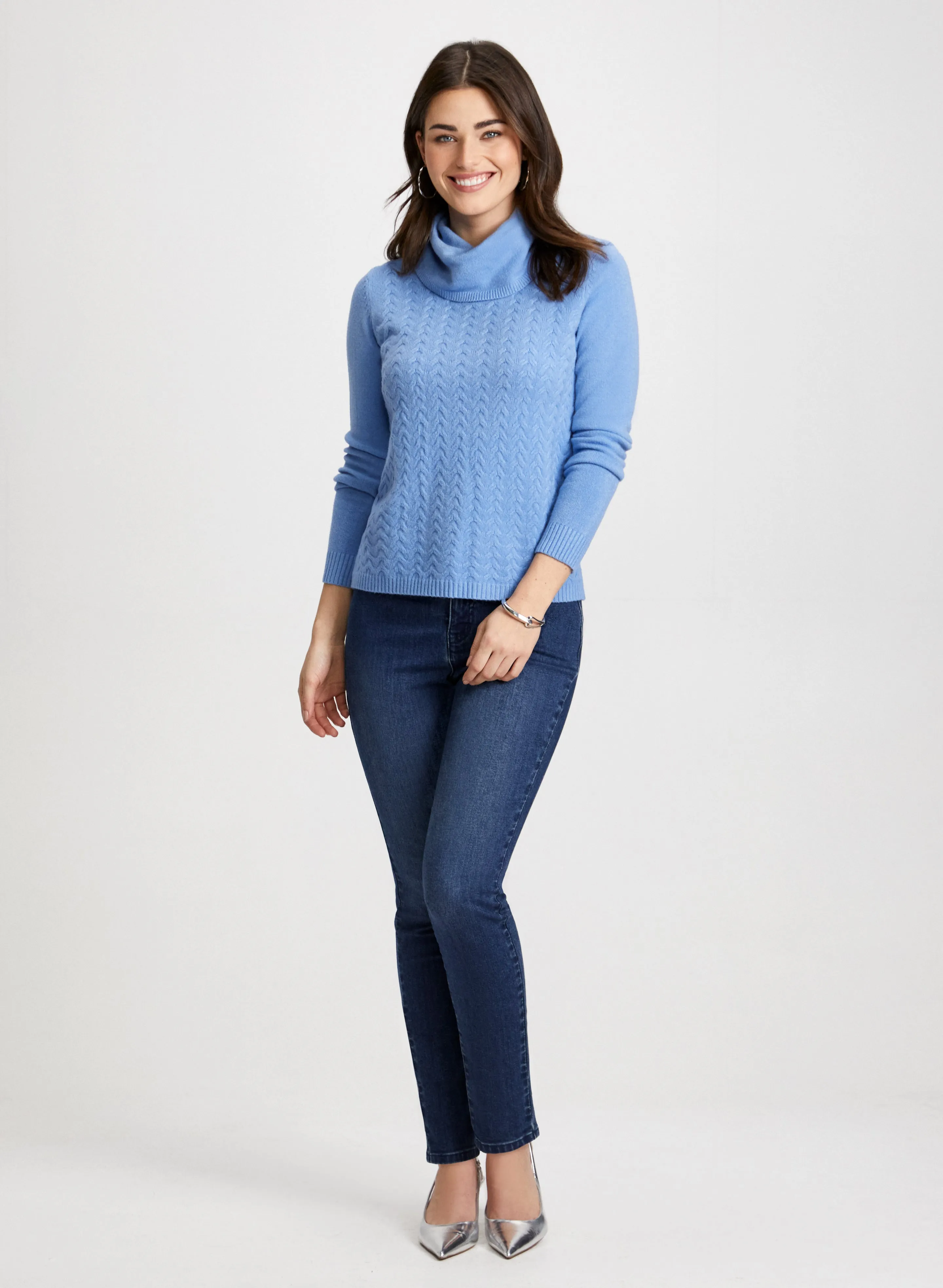 Cable Knit Sweater & Slim Leg Jeans sold by Laura