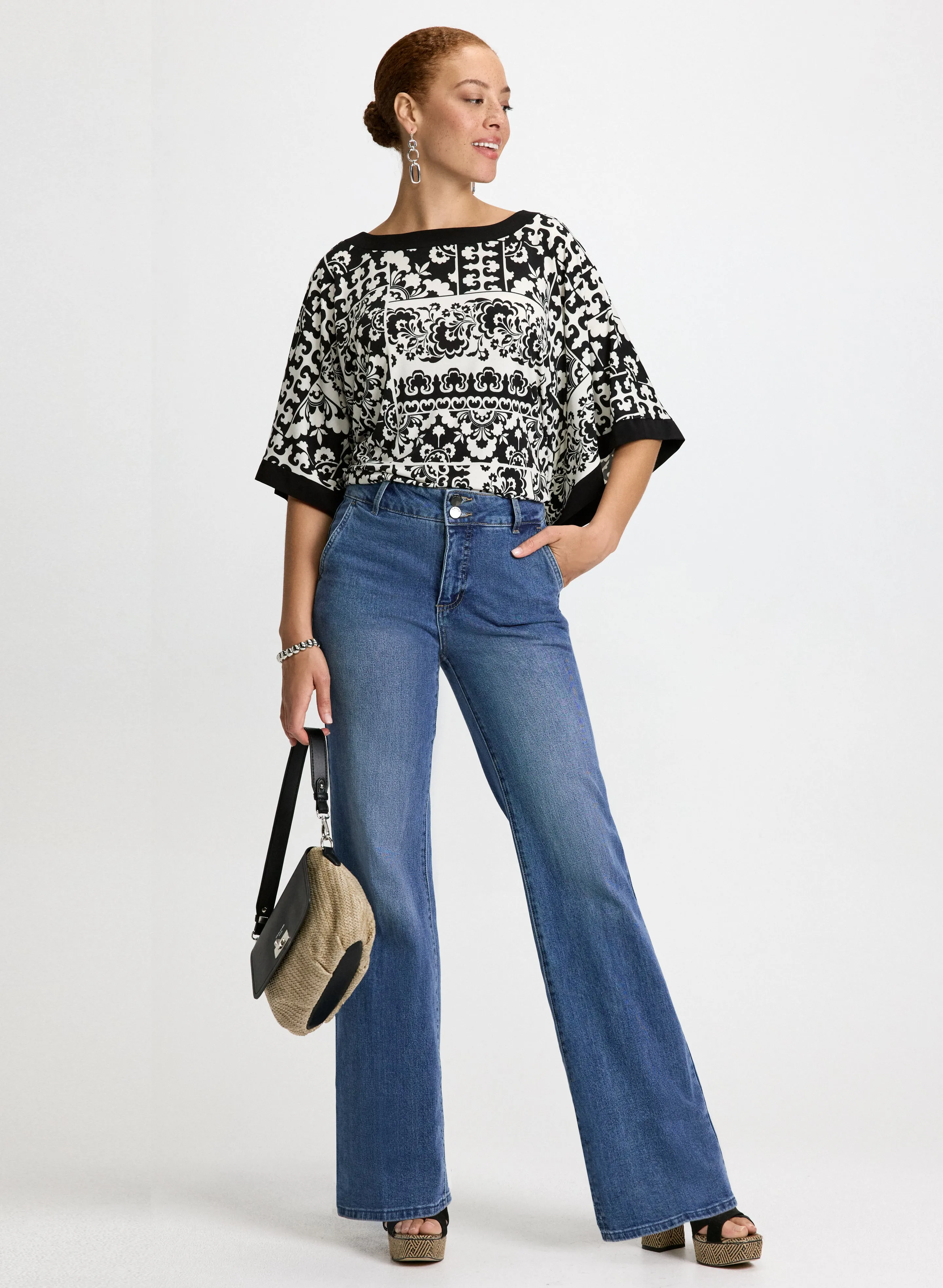 Paisley Poncho Top & Flared Denim Pants sold by Laura