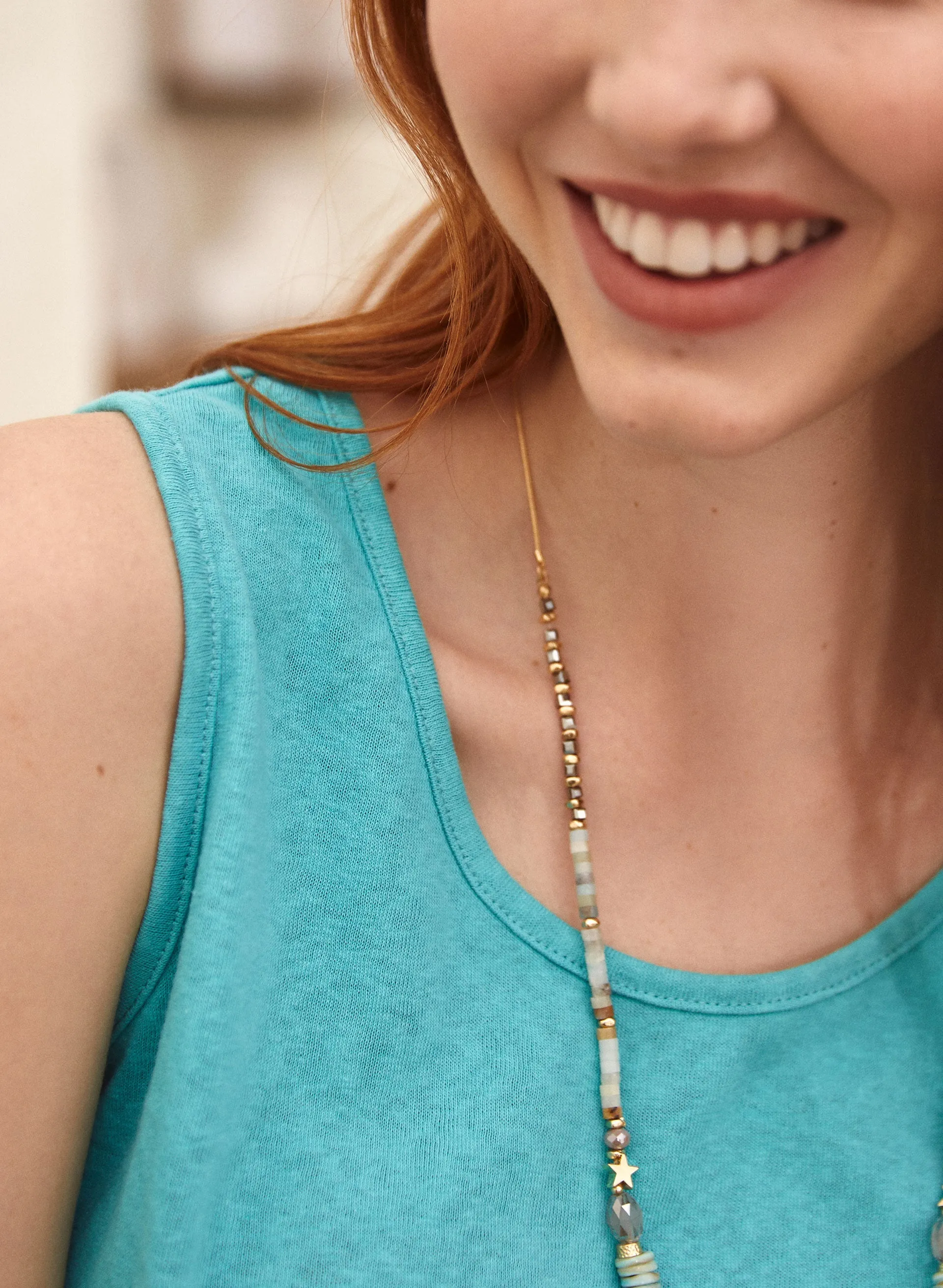 Sleeveless Scoop Neck Top sold by Laura