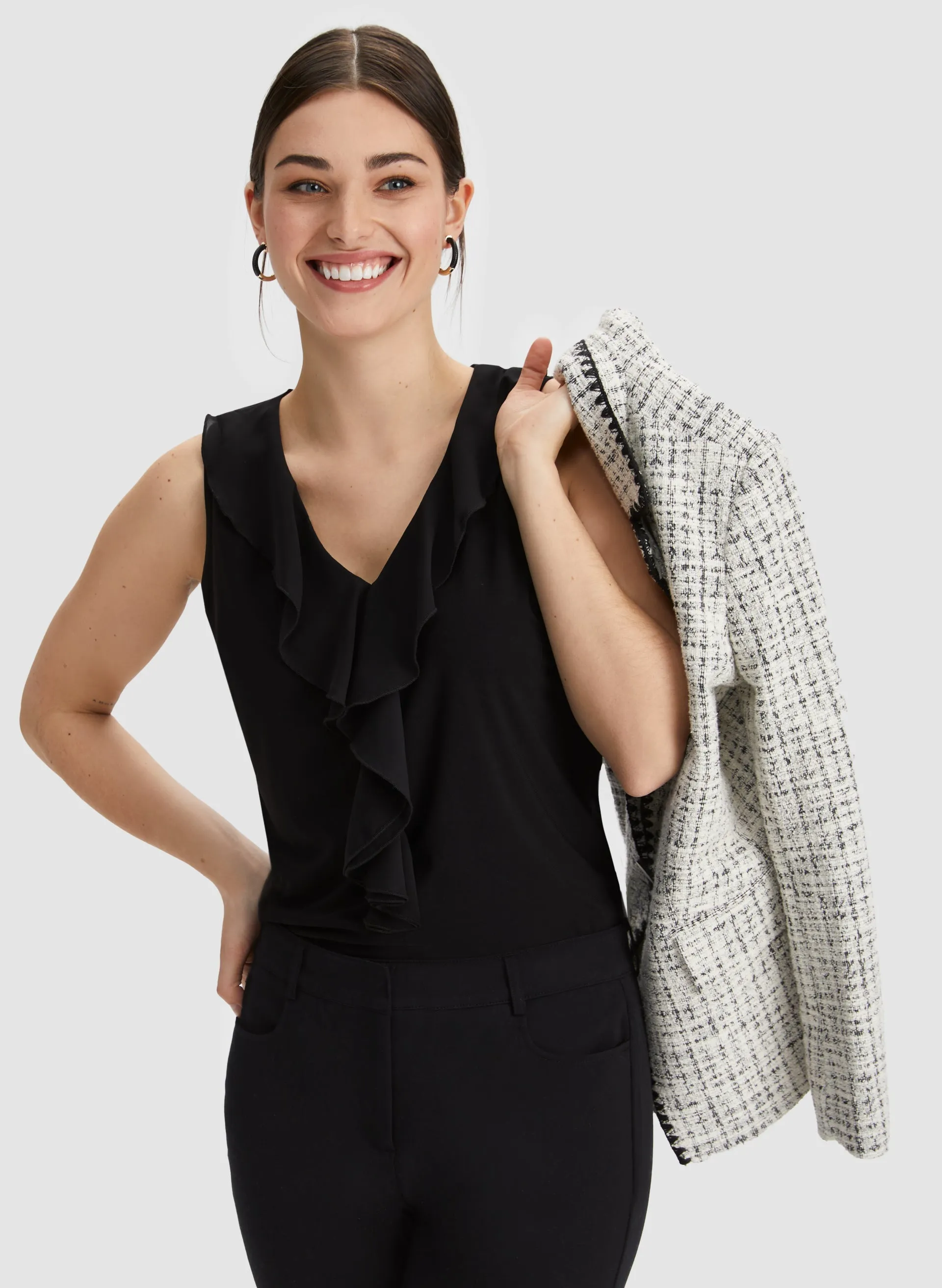 Ruffle Trim Sleeveless Top sold by Laura