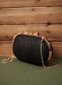 Bow Detail Clutch sold by Laura