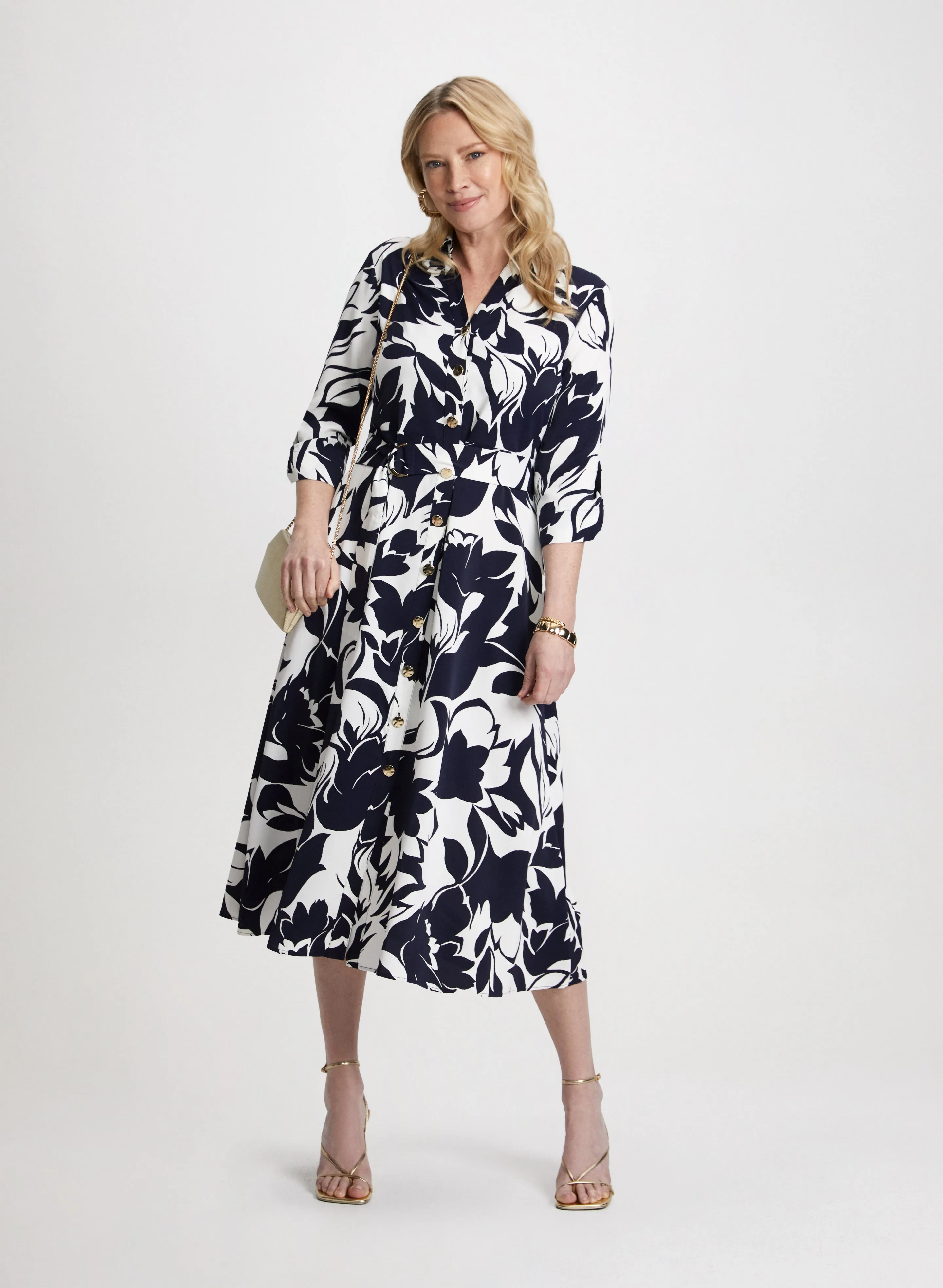 Floral Dress & Evening Clutch sold by Laura