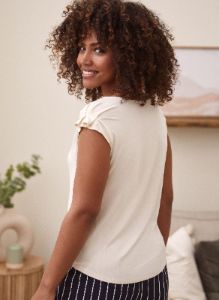 Ruffle Detail Short Sleeve Tee sold by Laura