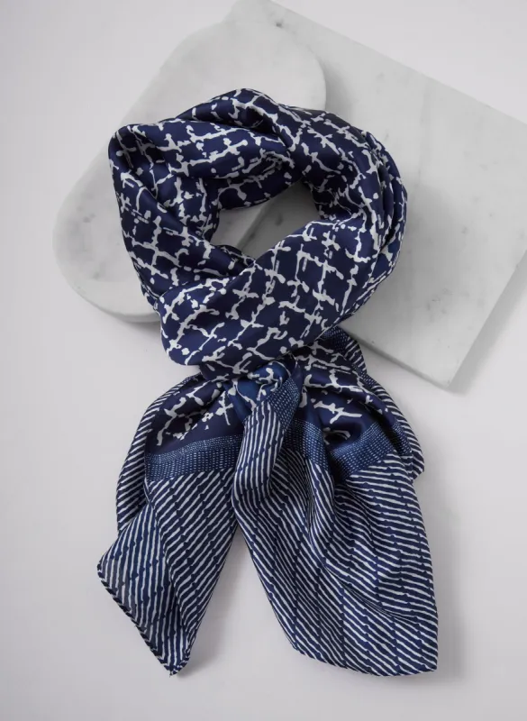 Grid Print Scarf sold by Laura