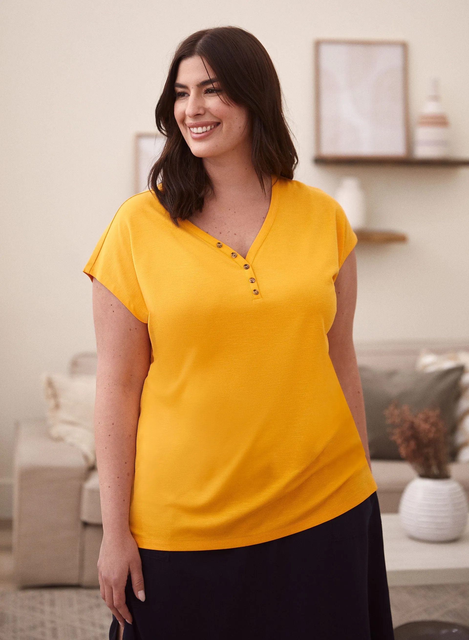 Drop Shoulder Henley Tee sold by Laura