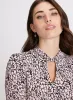 Floral Twist Neck Top sold by Laura