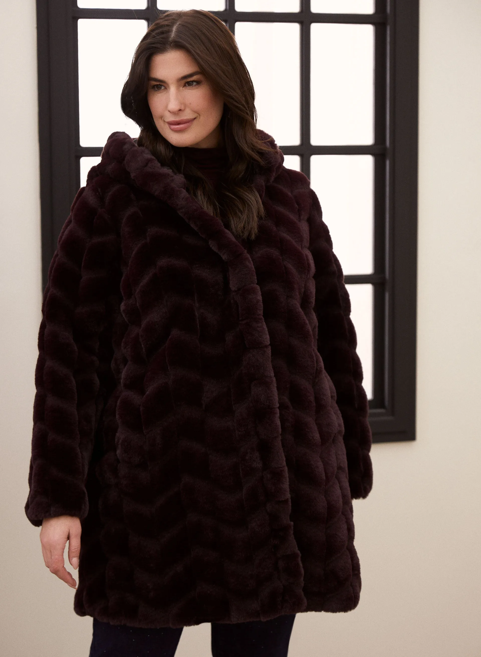 Hooded Faux Fur Coat sold by Laura