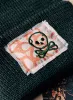 knit "lost paradise" watch cap sold by Imogene + Willie