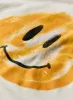 the "smiley" tee sold by Imogene + Willie
