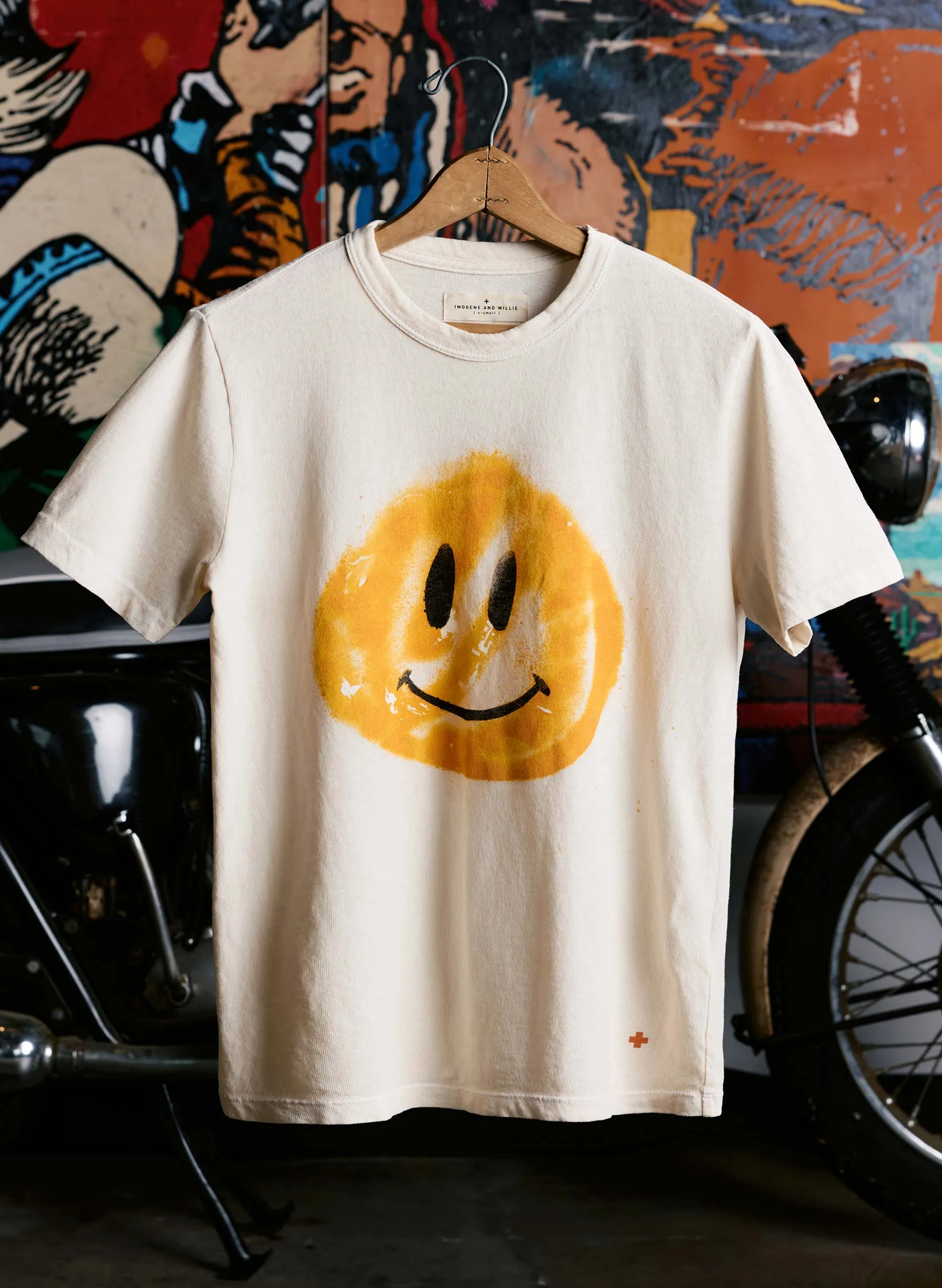 the "smiley" tee sold by Imogene + Willie