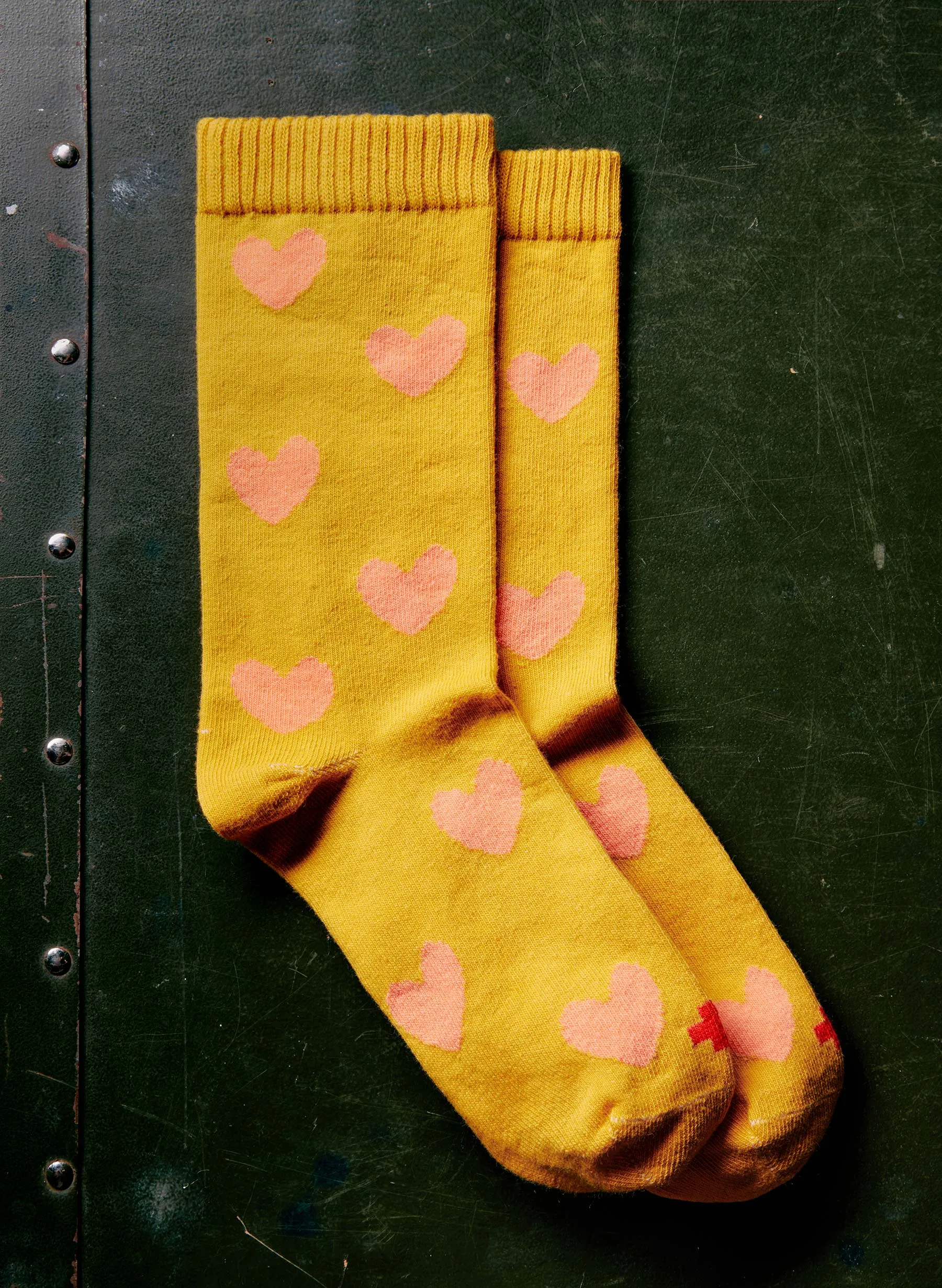 heart sock in gold sold by Imogene + Willie