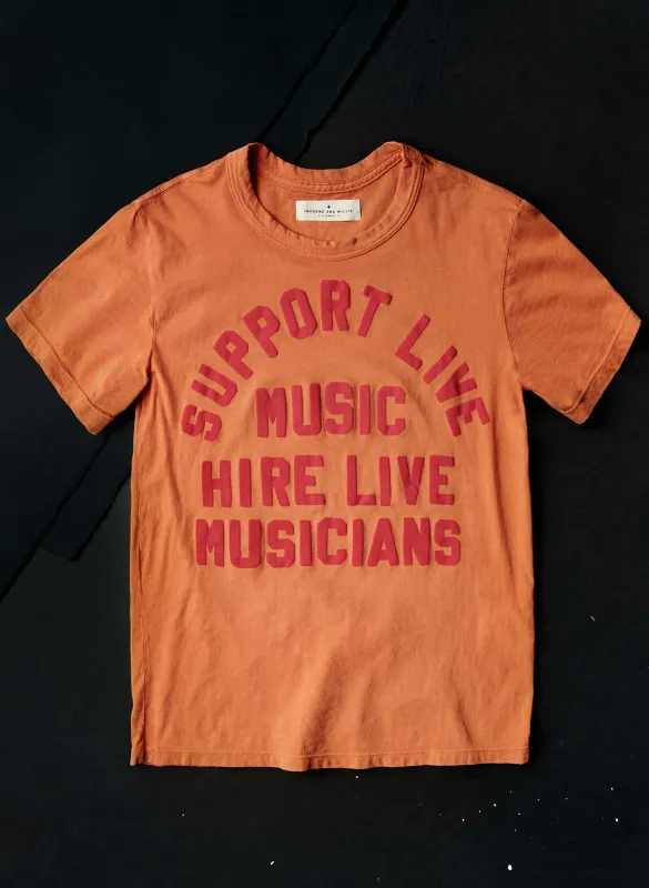 the "support live music" tee in orange sold by Imogene + Willie