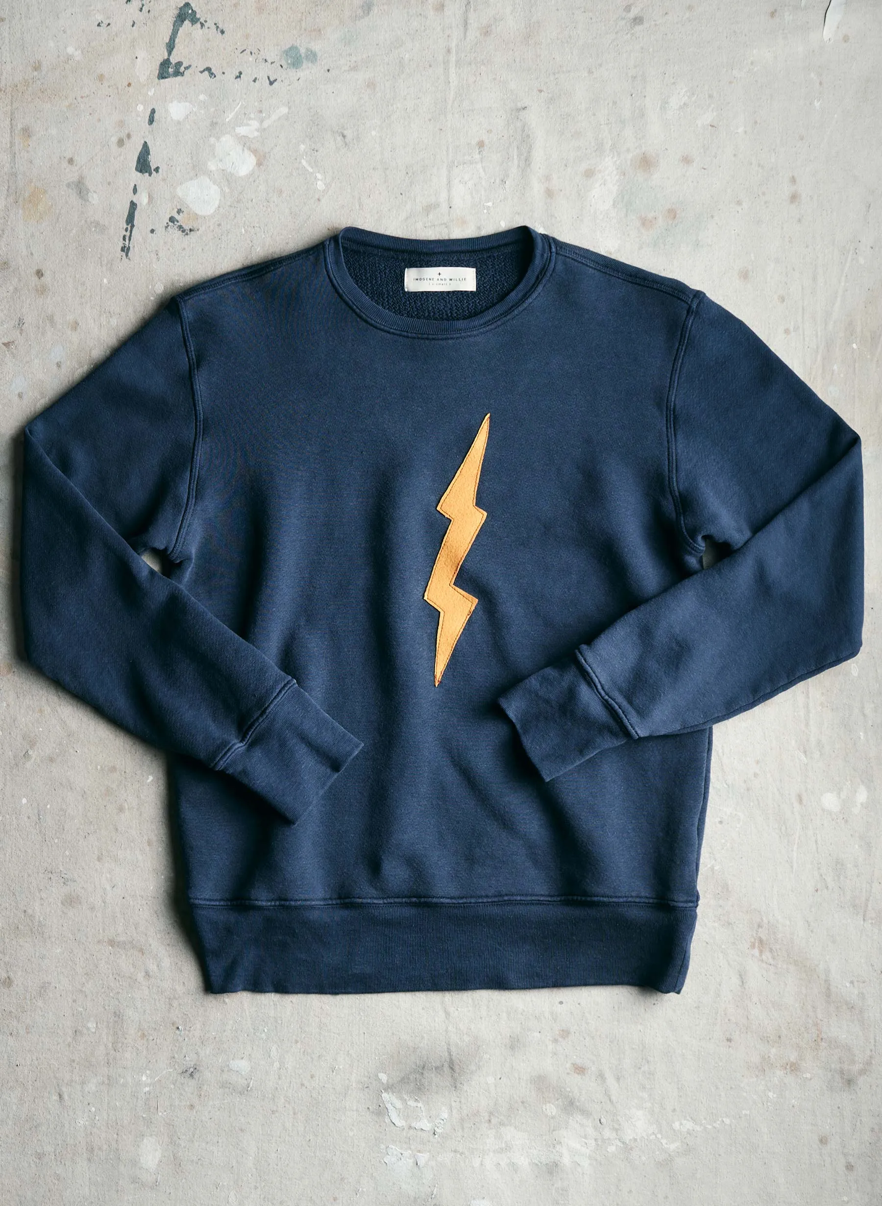 the "bolt" sweatshirt in faded navy sold by Imogene + Willie