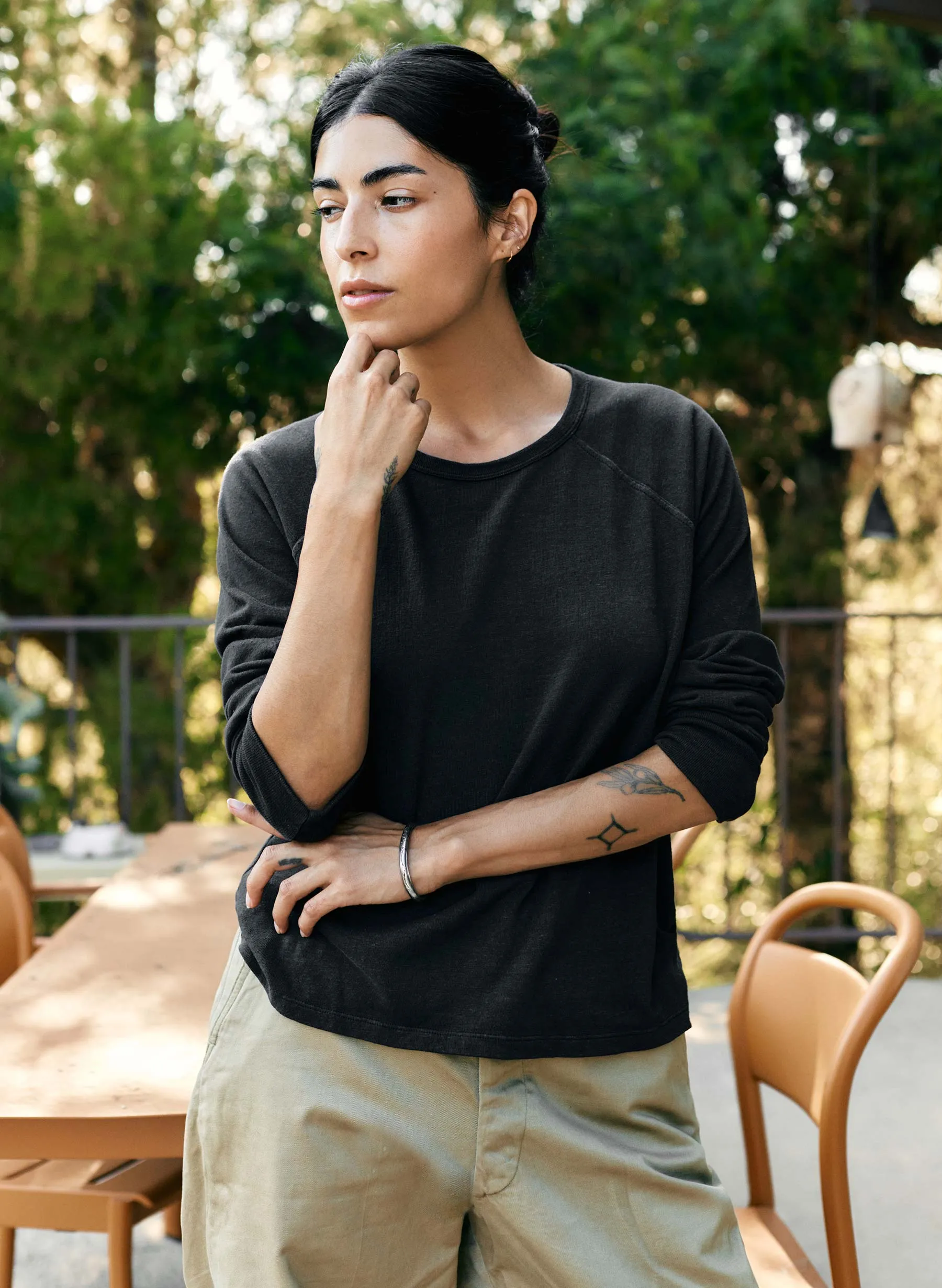 the long sleeve raglan in faded black sold by Imogene + Willie