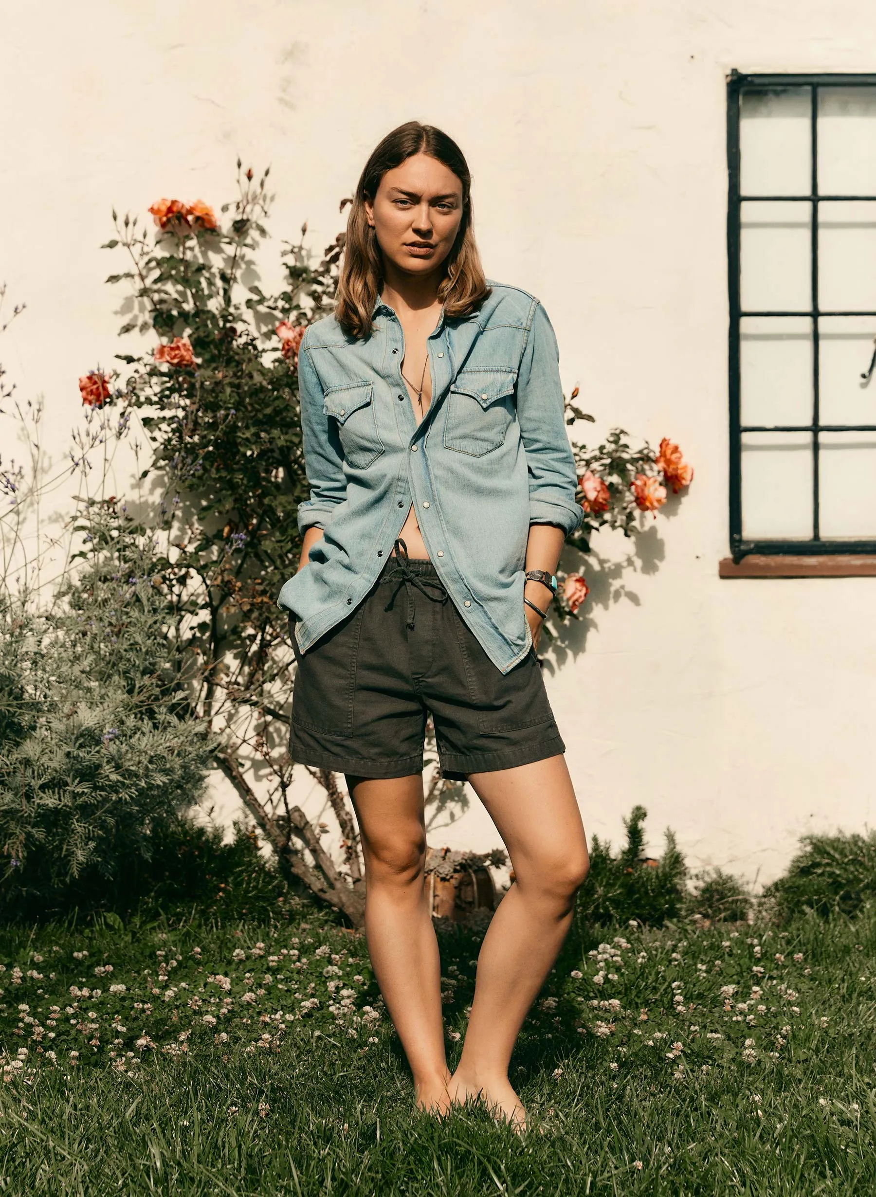 the canvas lounge short in faded black sold by Imogene + Willie