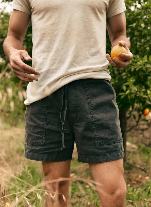 the canvas lounge short in faded black sold by Imogene + Willie