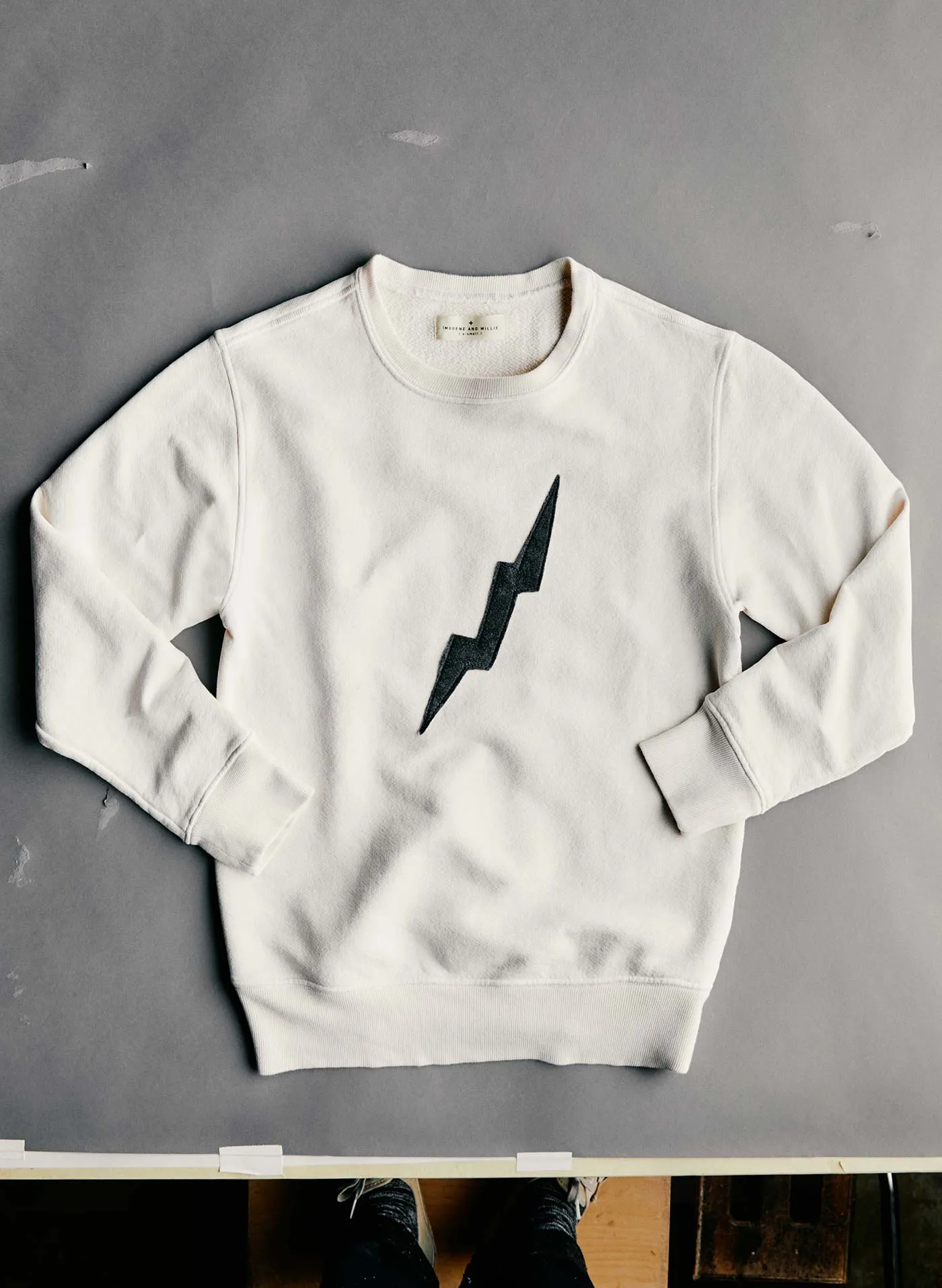 the "bolt" sweatshirt in white sold by Imogene + Willie