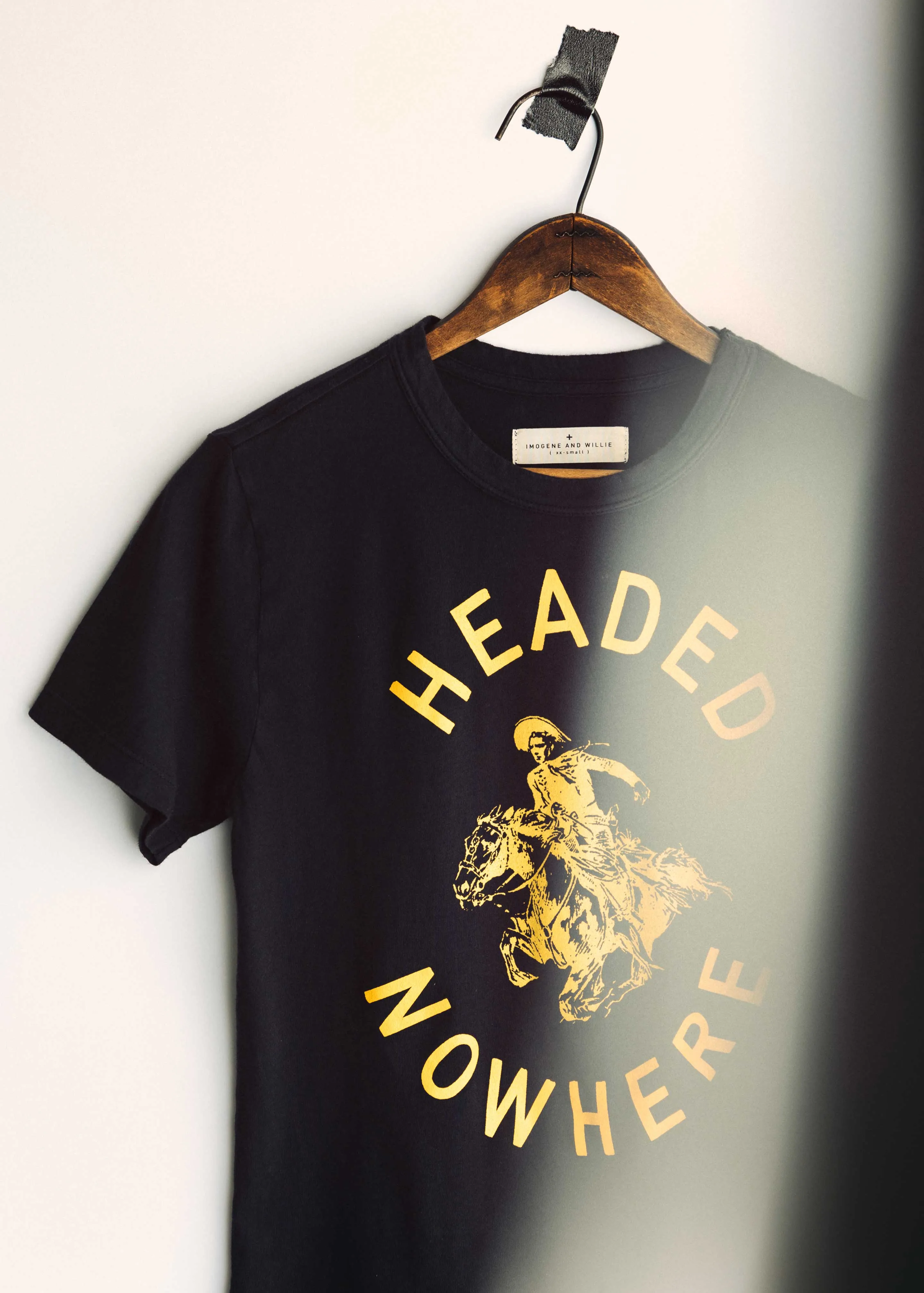 the "headed nowhere" tee sold by Imogene + Willie