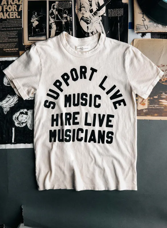 the "support live music" tee in vintage white sold by Imogene + Willie