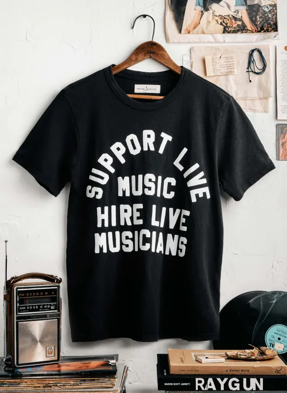 the "support live music" tee in black sold by Imogene + Willie