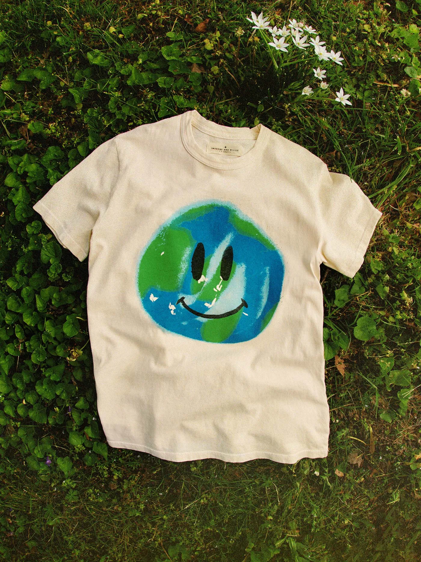 the "happy earth" tee sold by Imogene + Willie