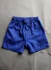 the canvas lounge short in klein blue sold by Imogene + Willie