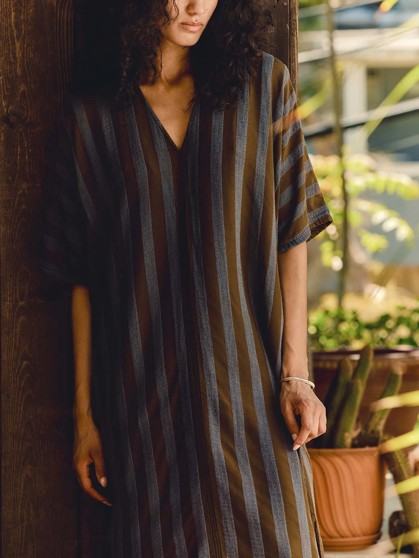 indigo jacquard stripe caftan sold by Imogene + Willie