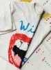 the "wild horses" tee sold by Imogene + Willie