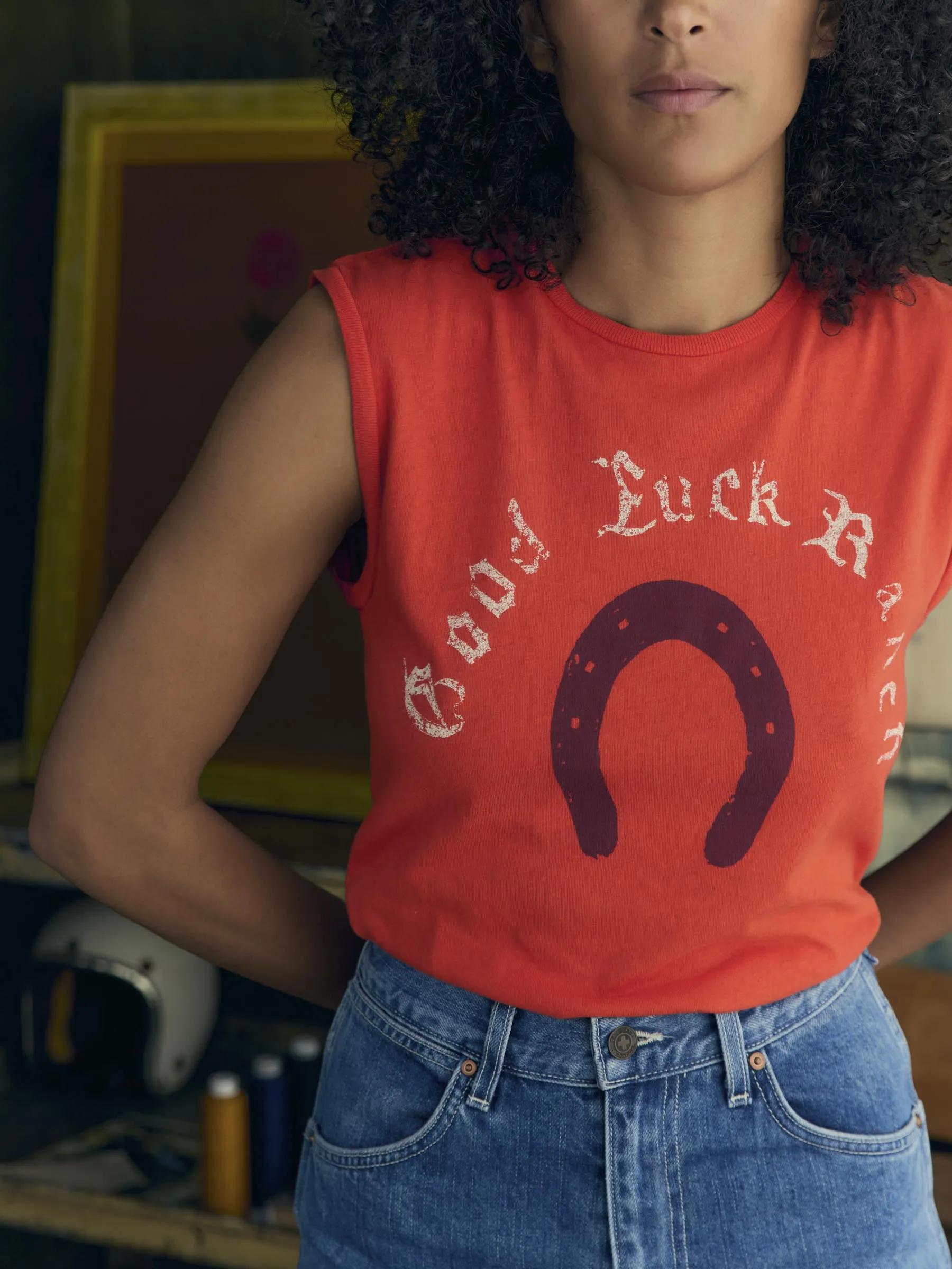 the "good luck ranch" muscle tee sold by Imogene + Willie