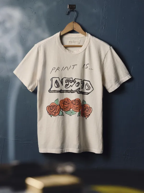 the "print is dead" tee sold by Imogene + Willie