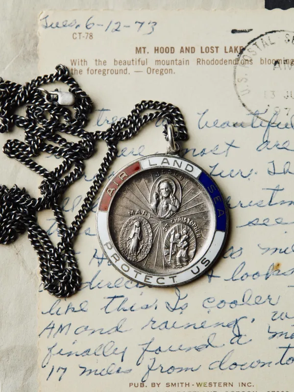 vintage "st. christopher" medal pendant sold by Imogene + Willie