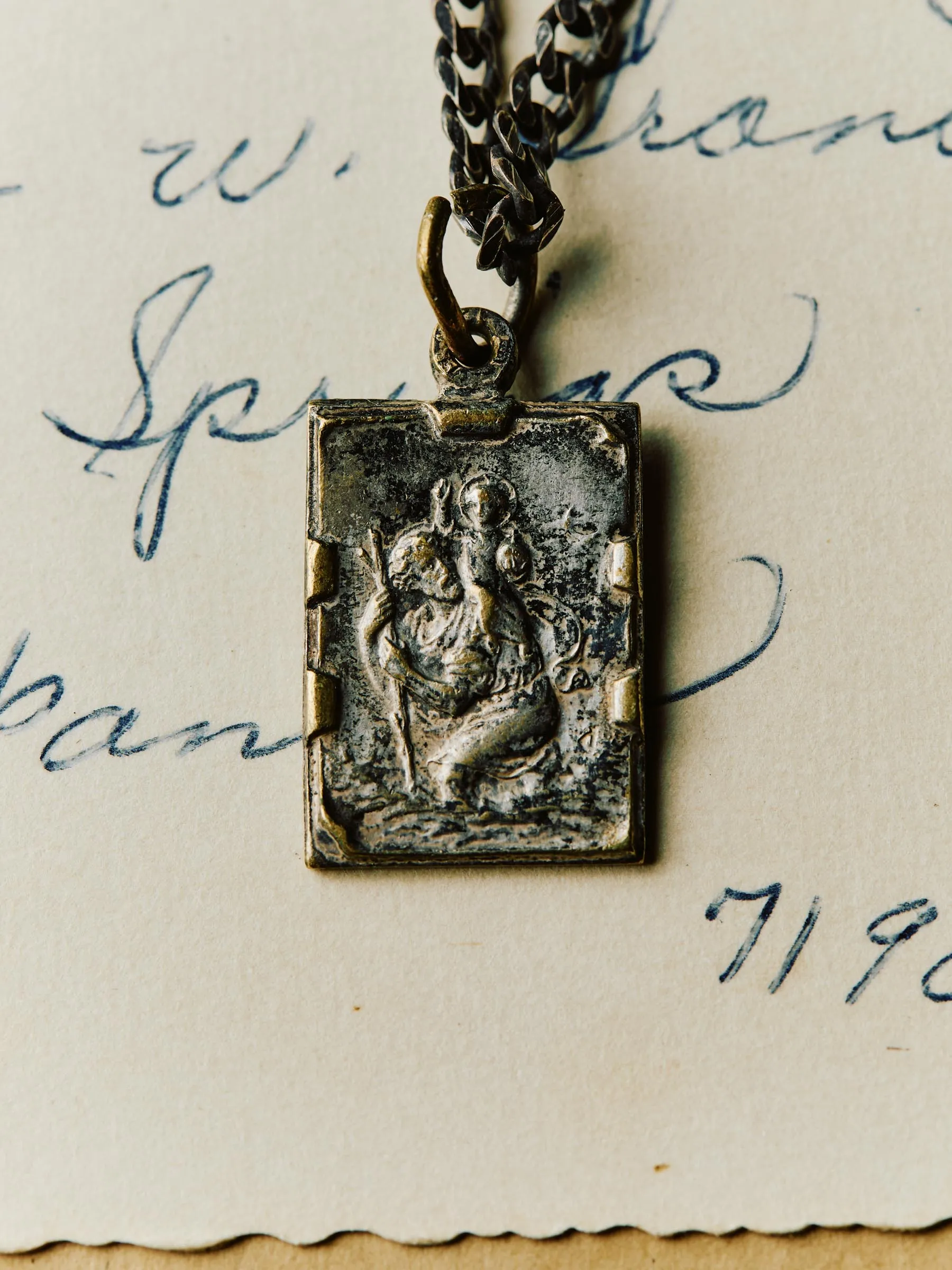 vintage "st. christopher" medal pendant sold by Imogene + Willie