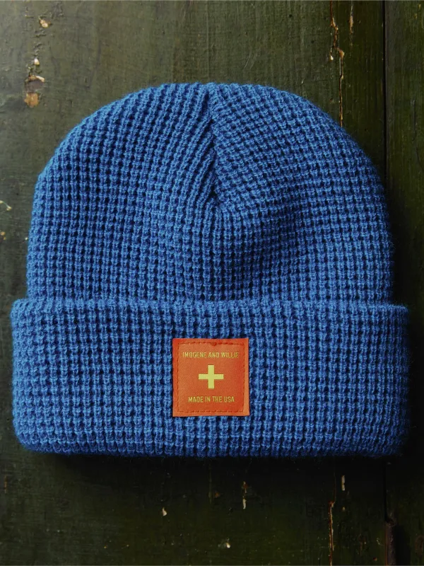 the i+w blue military cap sold by Imogene + Willie