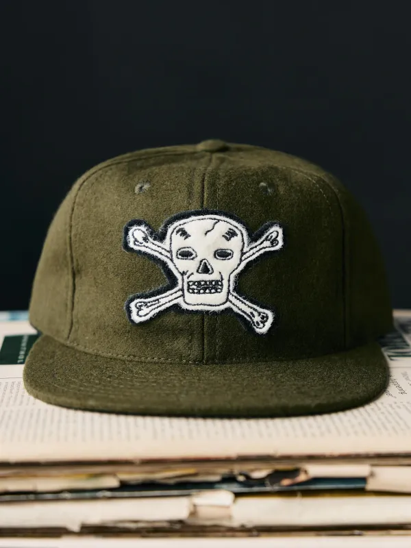 the wool "hellcats" cap in olive made by Imogene + Willie