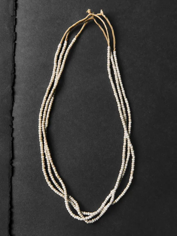 bone small glass beads sold by Imogene + Willie