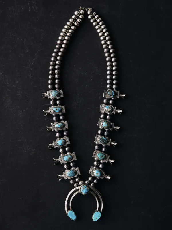 vintage turquoise squash blossom sold by Imogene + Willie